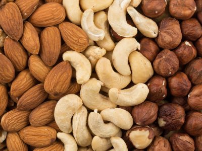 U.S. adults put on about a pound a year on average. But people who had a regular nut-snacking habit put on less weight and had a lower risk of becoming obese over time, a new study finds.